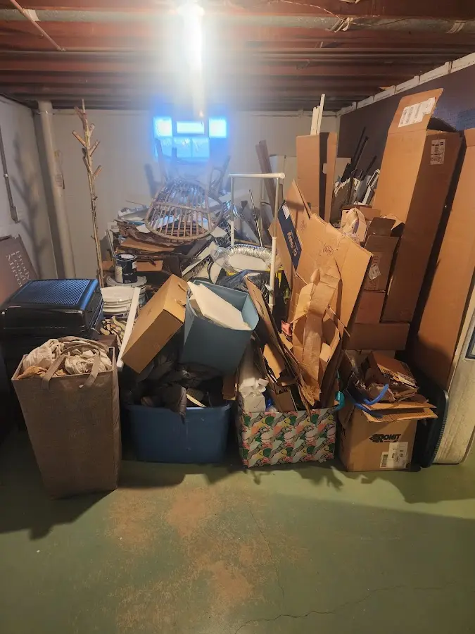 Roll-off dumpster container at job site for Concrete Dumpster Rental in Weston